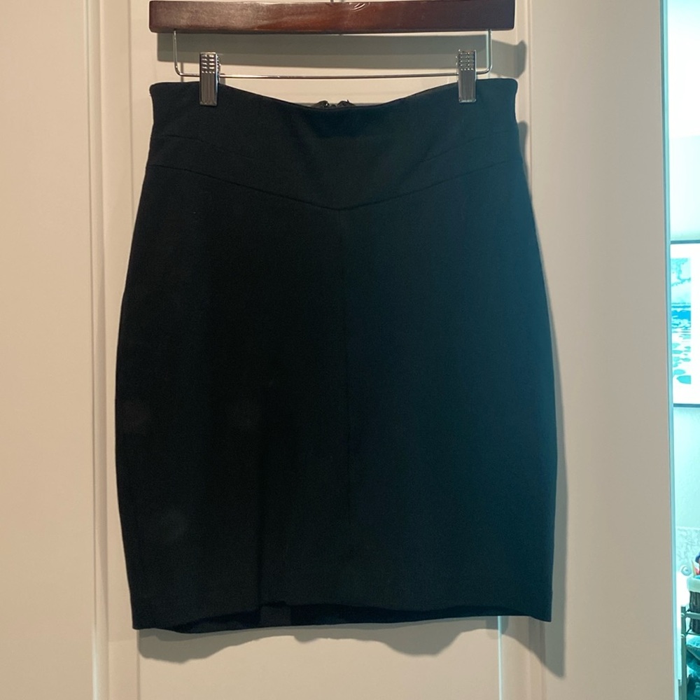 Ann Taylor, black pencil skirt back zip. Color black size 6 petite